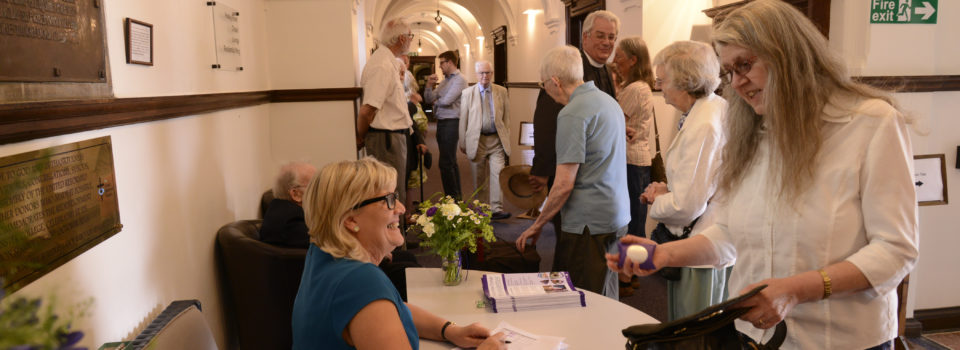 Syd welcoming guests at event